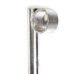 A close-up view of the top section of a galvanized steel ground pin, highlighting the securely welded circular ring designed to provide leverage when pulling the stake from the ground.