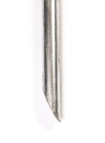 A detailed close-up of the bottom end of a galvanized steel ground pin, showing its angled chisel-cut tip engineered for easier driving into compacted soil or asphalt.