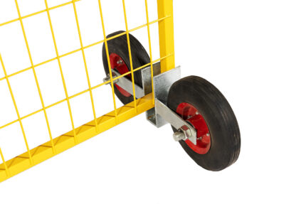 A close-up angle showing the bottom frame of a yellow temporary fence panel slotted into a galvanized wheel assembly with two solid rubber tires and red rims.