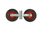A direct top-down view of an unattached wheel assembly for temporary fences, featuring a central U-shaped bracket flanked by two solid black rubber wheels.