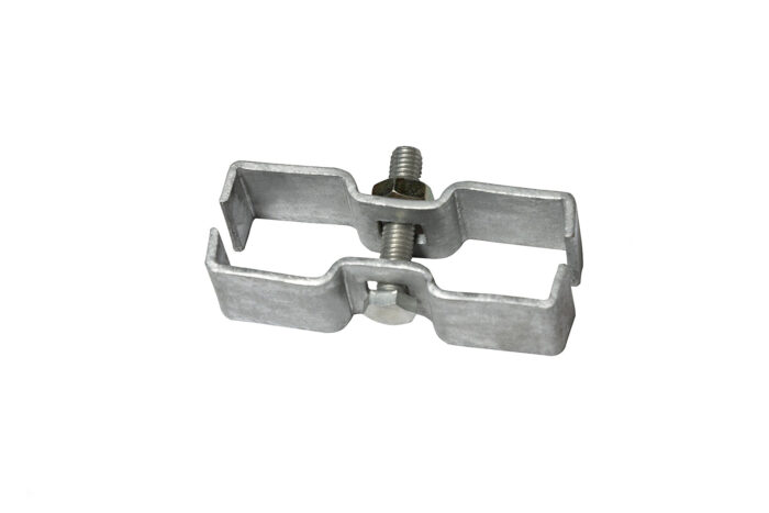 An inside view of a separated galvanized steel security clamp, showing the central threaded bolt and hex nut used to tighten the two bracket halves together.