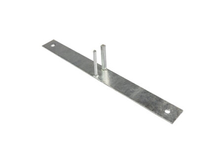 An angled view of a flat galvanized steel temporary fence stand, featuring two central vertical mounting pegs and pre-drilled anchoring holes at each end for secure ground installation.